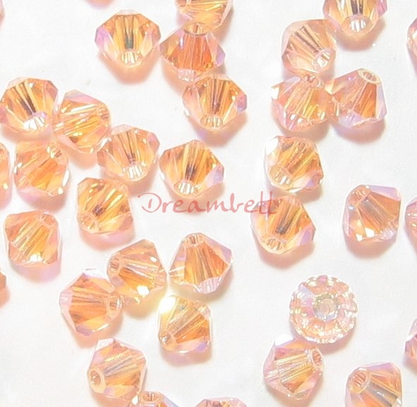24x Swarovski Elements Bicone Crystal Beads 5301 Lt Peach 2x AB