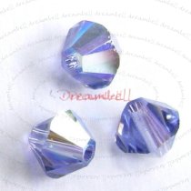 24x Swarovski Elements Xilion Crystal 5328 Tanzanite AB 6mm.