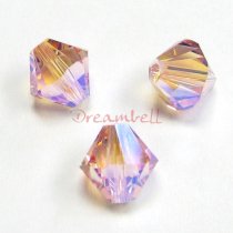 12x Swarovski Elements Crystal 5328 Xilion Light Rose AB 2x 8mm