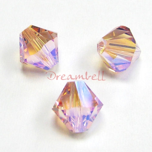 12x Swarovski Elements Crystal 5328 Xilion Light Rose AB 2x 8mm