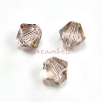 24 x Swarovski Elements Xilion Crystal 5328 Vintage Rose 4mm