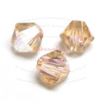24 x Swarovski Elements Xilion Crystal 5328 / 5301 Light Peach AB 4mm